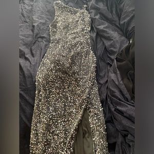 I am selling my dresses that only been worn once for $100 size S